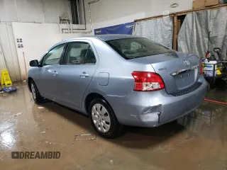 2010 Toyota Yaris with VIN JTDBT4K35A4064446, listed as a Copart auction lot 52099855 with 61,934 mi miles and Salvage Title. Bid and sale history available at carsss.com. Image 2.