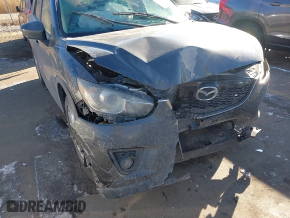 2014 Mazda CX-5 Grand Touring with VIN JM3KE2DY1E0421326, listed as a IAAI auction lot 41330794 with 127,589 mi miles. Bid and sale history available at carsss.com. Image 6.