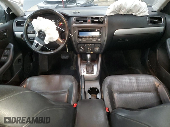 2013 Volkswagen Jetta SE with VIN 3VWDX7AJ2DM309725, listed as a Copart auction lot 86052114 with 70,828 mi miles and Salvage title. Bid and sale history available at DreamBid. Image 8.
