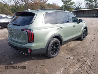 2024 Kia Telluride SX Prestige X-Pro with VIN 5XYP5DGC8RG459193, listed as a IAAI auction lot 40973506 with 10,541 mi miles and . Bid and sale history available at DreamBid. Image 4.