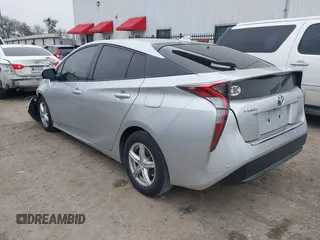 2018 Toyota Prius Two with VIN JTDKARFU7J3549201, listed as a IAAI auction lot 41589765 with 125,500 mi miles. Bid and sale history available at carsss.com. Image 3.
