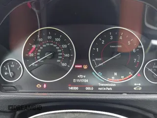 2015 BMW 4 Series 428i with VIN WBA3N3C55FK232319, listed as a IAAI auction lot 42136421 with 140,300 mi miles and . Bid and sale history available at DreamBid. Image 7.