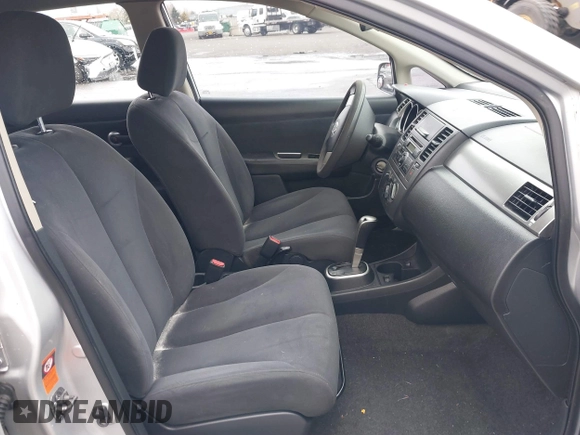 2007 Nissan Versa 1.8 SL with VIN 3N1BC11E97L447829, listed as a IAAI auction lot 41612386 with 123,500 mi miles. Bid and sale history available at carsss.com. Image 5.