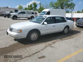 1990 Lincoln Continental z VIN 1LNCM9745LY751644, wystawiony jako Copart lot #56059275 z przebiegiem 41 928 mil mil oraz Czysty tytuł • Clean title. Historia ofert i sprzedaży dostępna na DreamBid. Obrazek 1.