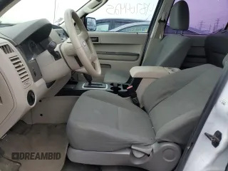 2009 Ford Escape XLS with VIN 1FMCU92729KD10213, listed as a Copart auction lot 48704425 with 114,219 mi miles and Salvage title. Bid and sale history available at DreamBid. Image 7.