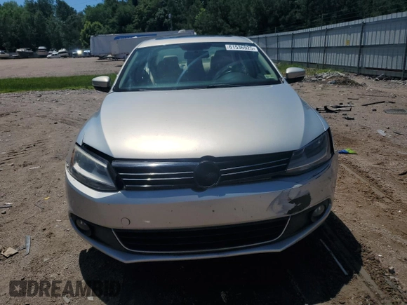 2012 Volkswagen Jetta TDI w/Premium & Nav z VIN 3VWLL7AJ7CM011404, wystawiony jako Copart lot #61536925 z przebiegiem 133 183 mil mil oraz Szkoda całkowita • Salvage title. Historia ofert i sprzedaży dostępna na DreamBid. Obrazek 5.