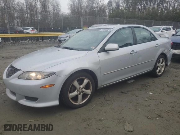 2004 Mazda 6 i with VIN 1YVFP80C045N09474, listed as a Copart auction lot 85890304 with 200,748 mi miles and Salvage Title. Bid and sale history available at DreamBid. Image 1.