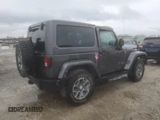 2014 Jeep Wrangler Rubicon with VIN 1C4BJWCG9EL189819, listed as a Copart auction lot 80522204 with 82,083 mi miles and Salvage title. Bid and sale history available at DreamBid. Image 3.