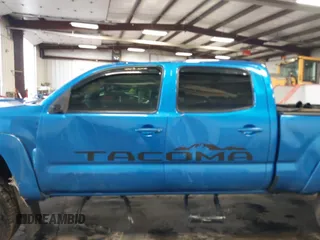 2009 Toyota Tacoma z VIN 5TEMU52N29Z656158, wystawiony jako IAAI lot #41652533 z przebiegiem 138 563 mil mil oraz . Historia ofert i sprzedaży dostępna na DreamBid. Obrazek 14.