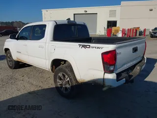 2018 Toyota Tacoma SR5 with VIN 3TMAZ5CN4JM062272, listed as a IAAI auction lot 41671472 with 114,566 mi miles and . Bid and sale history available at DreamBid. Image 3.