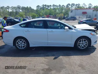 2016 Ford Fusion SE with VIN 3FA6P0HDXGR403268, listed as a IAAI auction lot 41936911 with 165,074 mi miles. Bid and sale history available at carsss.com. Image 13.