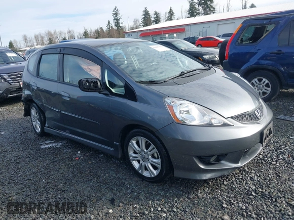 2011 Honda Fit Sport z VIN JHMGE8H54BC000162, wystawiony jako IAAI lot #41665321 z przebiegiem 154 531 mil mil oraz . Historia ofert i sprzedaży dostępna na DreamBid. Obrazek 1.