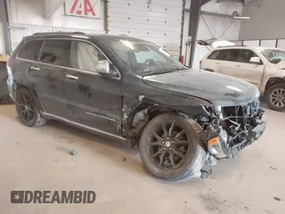 2015 Jeep Grand Cherokee Summit with VIN 1C4RJFJG8FC943716, listed as a IAAI auction lot 41386081 with 56,485 mi miles. Bid and sale history available at carsss.com. Image 1.