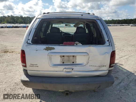 2000 Dodge Caravan SE with VIN 2B4GP45G0YR525310, listed as a Copart auction lot 69596394 with 299,957 mi miles and Salvage Title. Bid and sale history available at carsss.com. Image 6.