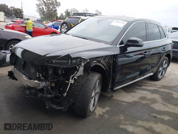 2023 Audi Q5 Premium Plus z VIN WA1BBAFY7P2187588, wystawiony jako IAAI lot #42052046 z przebiegiem 18 987 mil mil oraz . Historia ofert i sprzedaży dostępna na DreamBid. Obrazek 2.