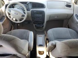 2001 Ford Windstar Wagon LX with VIN 2FMZA51441BA35669, listed as a Copart auction lot 73283214 with 240,538 mi miles and Salvage Title. Bid and sale history available at carsss.com. Image 8.