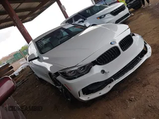 2018 BMW 4 Series 440i with VIN WBA4J5C56JBF07770, listed as a IAAI auction lot 41948710 with 69,655 mi miles and . Bid and sale history available at carsss.com. Image 19.