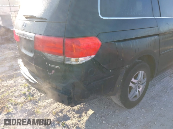 2010 Honda Odyssey Touring with VIN 5FNRL3H95AB031007, listed as a IAAI auction lot 41852435 with 207,919 mi miles. Bid and sale history available at carsss.com. Image 14.