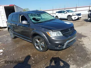 2016 Dodge Journey Crossroad Plus z VIN 3C4PDDGG9GT121667, wystawiony jako IAAI lot #41941932 z przebiegiem 131 597 mil mil oraz . Historia ofert i sprzedaży dostępna na DreamBid. Obrazek 1.