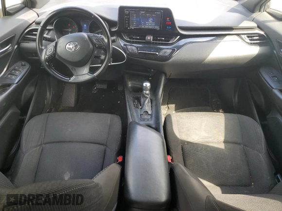 2018 Toyota C-HR XLE z VIN JTNKHMBX2J1003394, wystawiony jako Copart lot #58234865 z przebiegiem 132 574 mil mil oraz Szkoda całkowita • Salvage title. Historia ofert i sprzedaży dostępna na DreamBid. Obrazek 8.