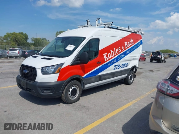 2023 Ford Transit Cargo with VIN 1FTBR1C80PKA43077, listed as a IAAI auction lot 40182475 with 15,656 mi miles and . Bid and sale history available at DreamBid. Image 18.