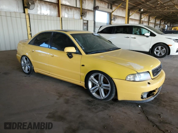 2000 Audi S4 z VIN WAUDD68D1YA107657, wystawiony jako Copart lot #81312104 z przebiegiem 133 371 mil mil oraz Czysty tytuł • Clean title. Historia ofert i sprzedaży dostępna na DreamBid. Obrazek 4.