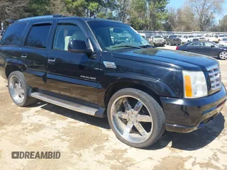 2003 Cadillac Escalade z VIN 1GYEK63N53R149413, wystawiony jako IAAI lot #41809120 z przebiegiem 103 859 mil mil oraz . Historia ofert i sprzedaży dostępna na DreamBid. Obrazek 1.
