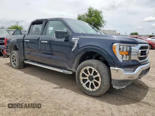 2021 Ford F-150 XL with VIN 1FTFW1E80MFA32611, listed as a Copart auction lot 61899255 with 98,278 mi miles and Salvage title. Bid and sale history available at DreamBid. Image 4.
