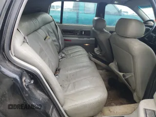 1996 Cadillac Fleetwood z VIN 1G6DW52P7TR710605, wystawiony jako Copart lot #51814605 z przebiegiem 280 654 mil mil oraz Nie do naprawy • Non repairable. Historia ofert i sprzedaży dostępna na DreamBid. Obrazek 10.