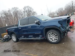 2021 GMC Sierra 1500 SLT z VIN 3GTU9DEL0MG262362, wystawiony jako IAAI lot #41433392 z przebiegiem 69 713 mil mil oraz . Historia ofert i sprzedaży dostępna na DreamBid. Obrazek 14.