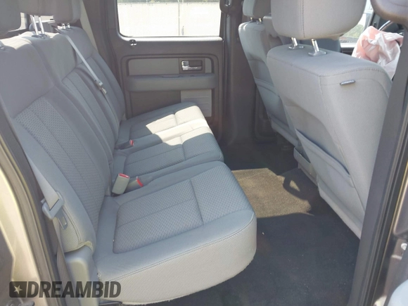 2014 Ford F-150 XL with VIN 1FTFW1CF2EKF75517, listed as a IAAI auction lot 40534480 with 121,035 mi miles. Bid and sale history available at carsss.com. Image 8.