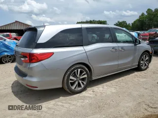 2022 Honda Odyssey Touring с VIN 5FNRL6H82NB009321, выставлен на аукционе Copart как лот 59058535 с пробегом 88 073 миль миль и Списание • Salvage title. История ставок и продаж доступна на DreamBid. Изображение 3.