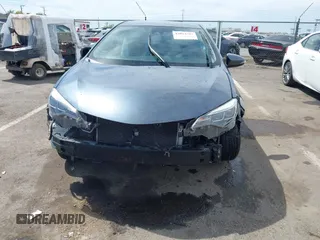 2017 Toyota Corolla L z VIN 2T1BURHE3HC954048, wystawiony jako IAAI lot #42014307 z przebiegiem 128 900 mil mil oraz . Historia ofert i sprzedaży dostępna na DreamBid. Obrazek 13.