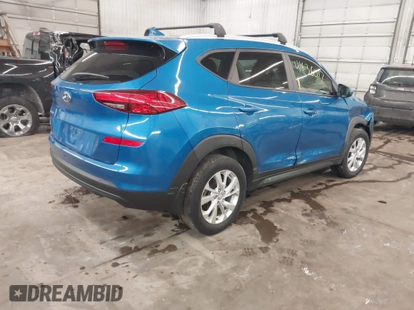 2021 Hyundai Tucson Value with VIN KM8J33A43MU301869, listed as a IAAI auction lot 41636017 with 55,188 mi miles and . Bid and sale history available at DreamBid. Image 4.
