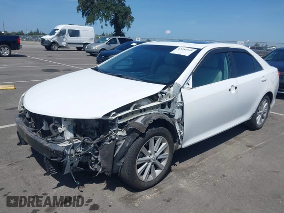 2012 Toyota Camry XLE z VIN 4T1BD1FK0CU007194, wystawiony jako IAAI lot #42281914 z przebiegiem 186 379 mil mil oraz . Historia ofert i sprzedaży dostępna na DreamBid. Obrazek 18.