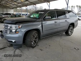 2018 Chevrolet Suburban Premier with VIN 1GNSCJKC1JR203318, listed as a Copart auction lot 44690745 with 120,137 mi miles and Salvage Title. Bid and sale history available at DreamBid. Image 1.