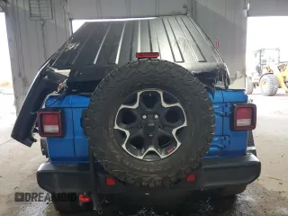 2023 Jeep Wrangler Rubicon z VIN 1C4HJXFN7PW693166, wystawiony jako Copart lot #84430324 z przebiegiem 40 093 mil mil oraz Szkoda całkowita • Salvage title. Historia ofert i sprzedaży dostępna na DreamBid. Obrazek 6.