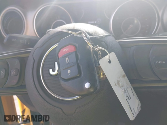 2019 Jeep Wrangler Unlimited Sport S with VIN 1C4HJXDG4KW579364, listed as a IAAI auction lot 41809318 with 22,370 mi miles and . Bid and sale history available at DreamBid. Image 11.