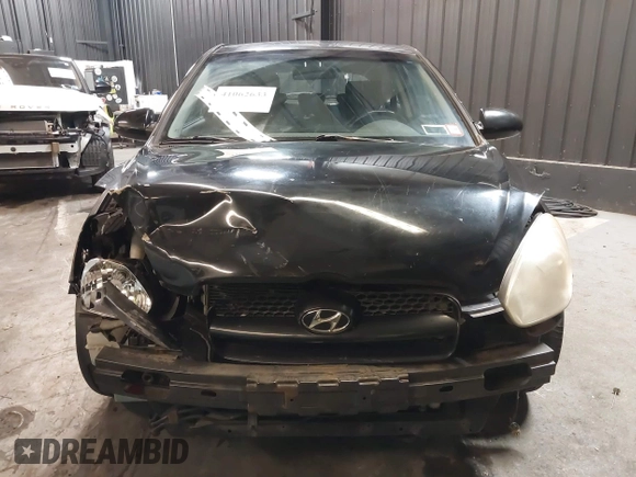 2007 Hyundai Accent SE with VIN KMHCN36C67U026540, listed as a IAAI auction lot 41062633 with 70,143 mi miles. Bid and sale history available at carsss.com. Image 6.