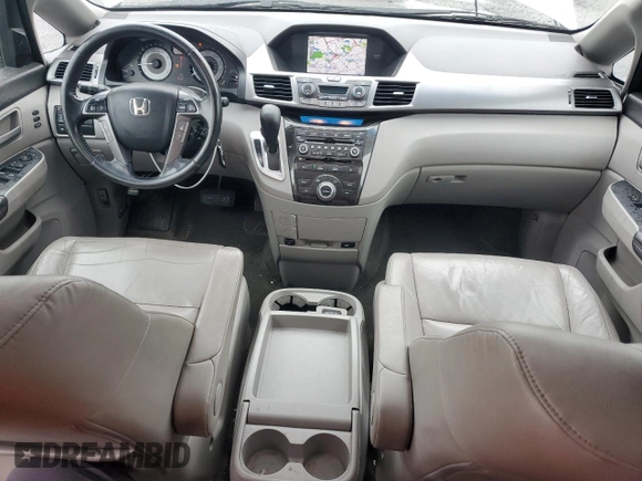 2011 Honda Odyssey Touring with VIN 5FNRL5H99BB021223, listed as a Copart auction lot 61171775 with 194,029 mi miles and Salvage title. Bid and sale history available at DreamBid. Image 8.
