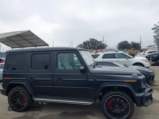 2021 Mercedes-Benz G 63 AMG z VIN W1NYC7HJ2MX423006, wystawiony jako IAAI lot #42170637 z przebiegiem 11 910 mil mil oraz . Historia ofert i sprzedaży dostępna na DreamBid. Obrazek 12.