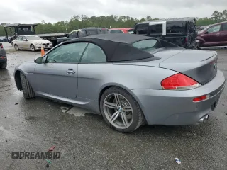 2007 BMW 6 Series M6 z VIN WBSEK93537CS32914, wystawiony jako Copart lot #59816795 z przebiegiem 82 046 mil mil oraz Czysty tytuł • Clean title. Historia ofert i sprzedaży dostępna na DreamBid. Obrazek 2.