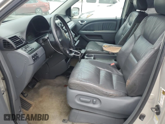 2006 Honda Odyssey Touring z VIN 5FNRL38886B000011, wystawiony jako Copart lot #57399225 z przebiegiem 256 217 mil mil oraz Szkoda całkowita • Salvage title. Historia ofert i sprzedaży dostępna na DreamBid. Obrazek 7.