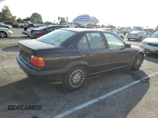 1997 BMW 3 Series 318i with VIN WBACC9327VEE58764, listed as a Copart auction lot 77671674 with 228,996 mi miles and Clean Title. Bid and sale history available at carsss.com. Image 3.