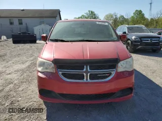 2014 Dodge Grand Caravan SXT with VIN 2C4RDGCG5ER182160, listed as a Copart auction lot 54140505 with 61,576 mi miles and Salvage Title. Bid and sale history available at DreamBid. Image 5.