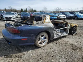 1999 Pontiac Firebird Formula with VIN 2G2FV22G0X2223301, listed as a Copart auction lot 52555795 with Not provided miles and Salvage title. Bid and sale history available at DreamBid. Image 3.