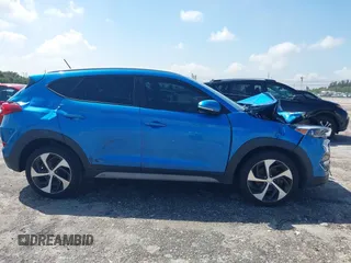 2017 Hyundai Tucson Value z VIN KM8J33A23HU540472, wystawiony jako IAAI lot #41935056 z przebiegiem 58 937 mil mil oraz . Historia ofert i sprzedaży dostępna na DreamBid. Obrazek 13.