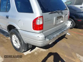 2002 Isuzu Rodeo S with VIN 4S2CK58WX24321556, listed as a IAAI auction lot 41405981 with 172,590 mi miles and . Bid and sale history available at DreamBid. Image 6.