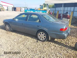 2000 Toyota Camry CE z VIN JT2BG22K5Y0476098, wystawiony jako IAAI lot #42200385 z przebiegiem Nie podano mil oraz . Historia ofert i sprzedaży dostępna na DreamBid. Obrazek 3.