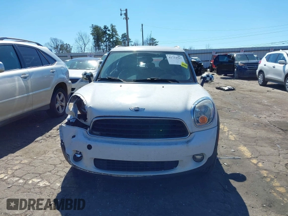 2014 MINI Countryman with VIN WMWZB3C52EWR42241, listed as a IAAI auction lot 41734963 with 121,325 mi miles and . Bid and sale history available at DreamBid. Image 12.